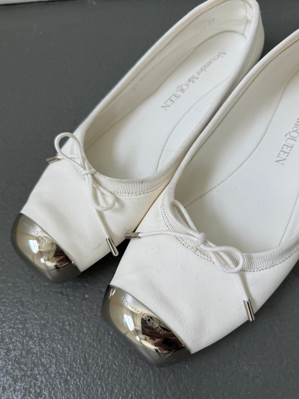 Alexander McQueen metal toecap flats